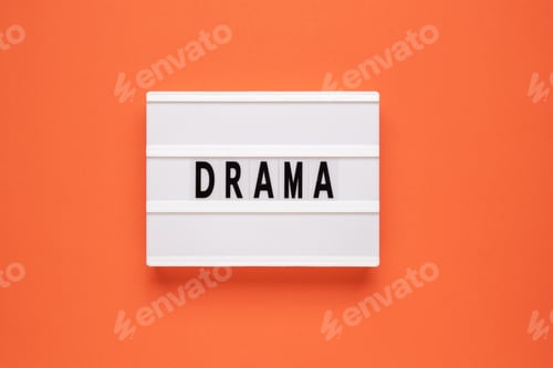 Preview: Lightbox with word drama on orange background.