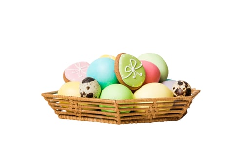 Preview: Basket of Colorful Easter Eggs and Decorated Cookies on White Background