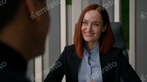 Preview: Caucasian businesswoman hiring new employee to business company smiling talk with unrecognizable