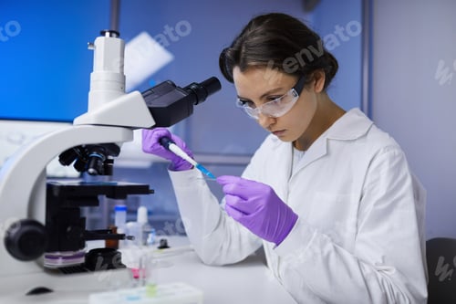 Scientist Works with Microscope and Sample in Lab