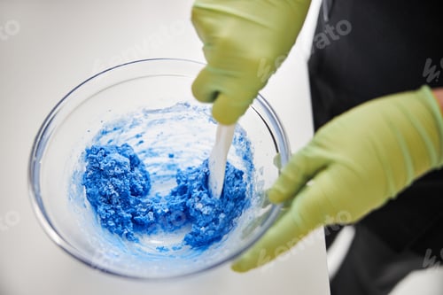 Preview: Professional spa worker making a foam for facial treatment