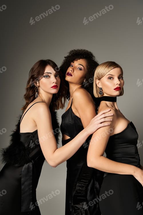 Preview: The triple elegance: three women in black dresses