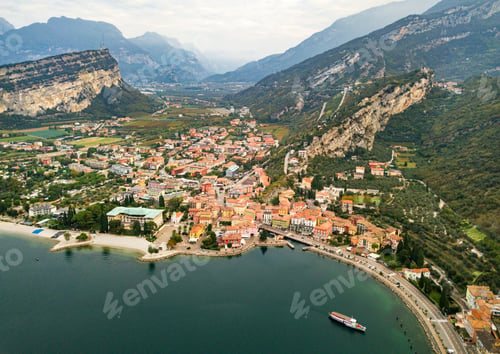 Preview: Top view of Lake Lago di Garda and the village of Torbole, alpine scenery. Italy