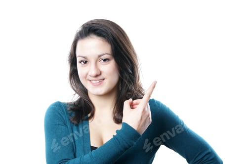 Preview: young woman pointing to copyspace