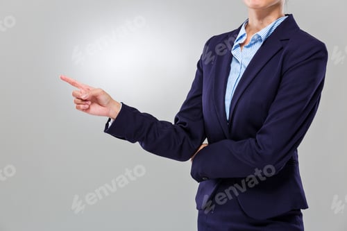 Preview: Businesswoman finger point aside