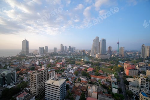 Preview: Colombo day time cityscape with view of Beira Lake surrounded by many large businesses
