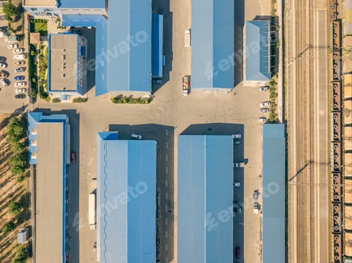Preview: aerial top view of warehouses hangars near the industrial factory zone f