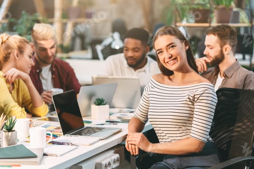 Preview: Young Professionals Collaborating in Modern Office During Daytime