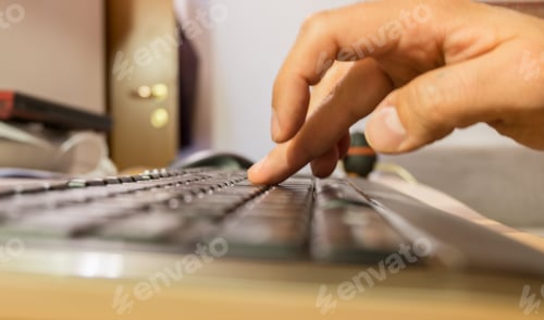 Preview: Finger typing on pc keyboard closeup