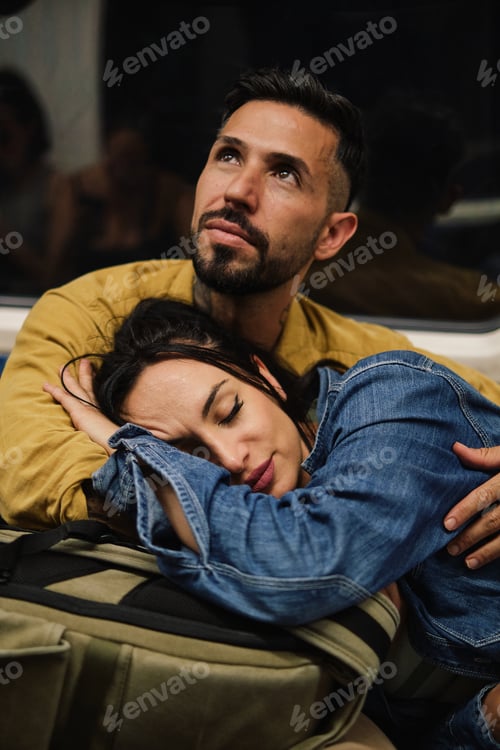 Preview: Young couple hugging in the subway