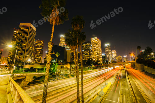 Preview: View of city skyline and highway at night, Los Angeles, California, USA