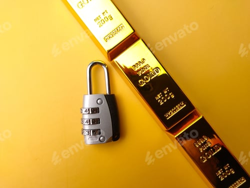 Preview: Gold bars and a padlock isolated on a yellow background - finance concept