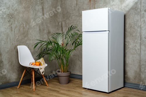 Preview: White Refrigerator Against Concrete Wall