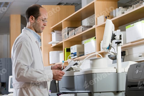 Preview: Scientist examining data in a laboratory setting