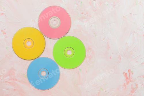Preview: CD or DVD discs on pink background