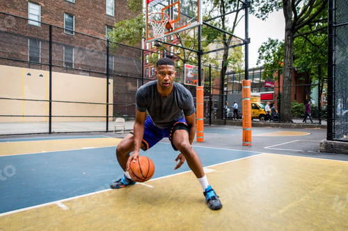 Preview: Basketball player training outdoors