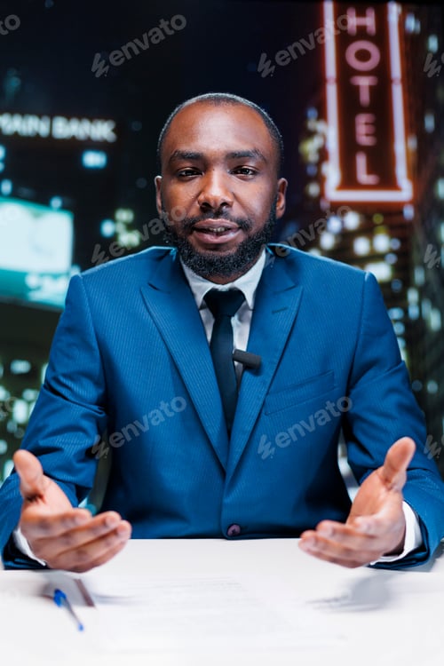Preview: Broadcaster doing live newscast on tv