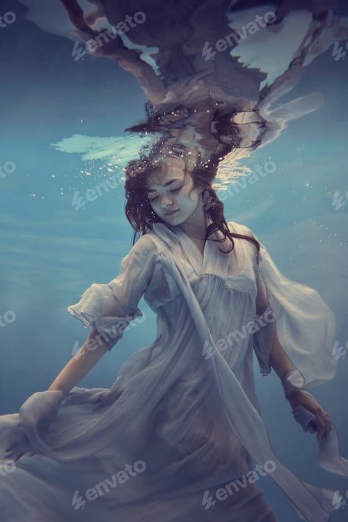 Preview: Portrait Of A Girl In A Blue Dress Under Water