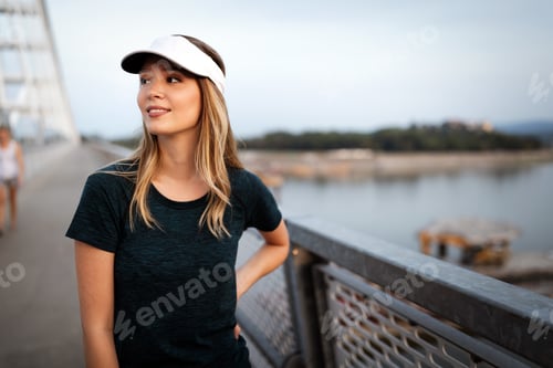 Preview: Portrait of woman taking break from running