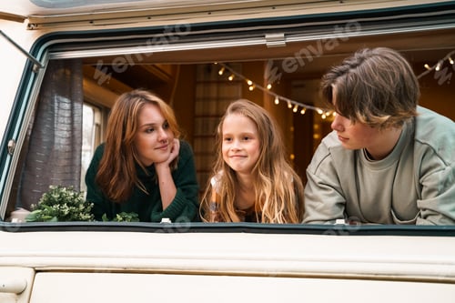 Preview: Children,family,brother sister traveling in camper,house on wheels. Trailer motor home.Looking in