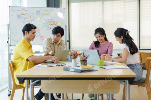 Preview: Group Young Asian business people with the creative work, talk and exchange idea