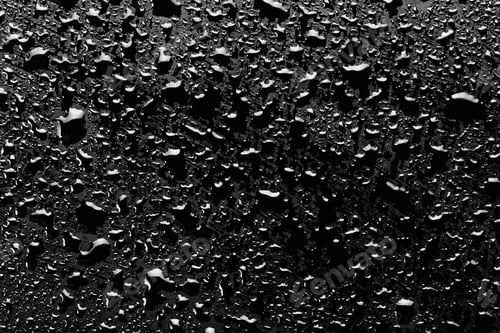Vista previa: gotas de agua salpican el suelo negro