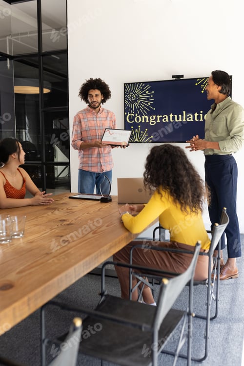 Preview: Celebrating success in office, team presenting awards with smiles and applause