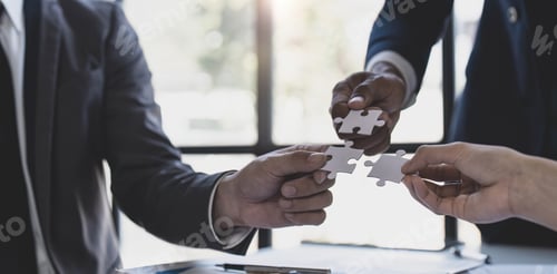 Preview: Business people with jigsaw puzzle pieces in office, Successful teamwork and partnership concept
