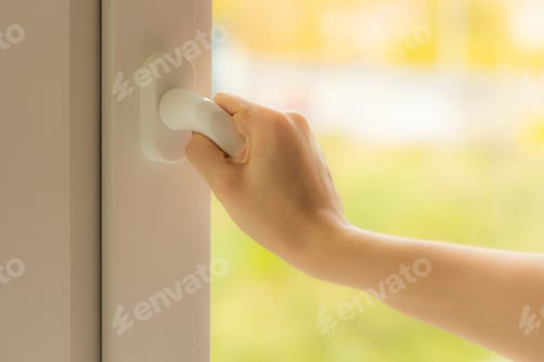 Preview: Woman hand opens the window