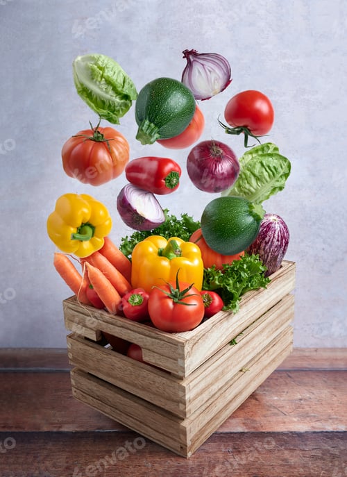 Preview: Fresh vegetables falling into wooden crate: healthy eating and farm fresh produce