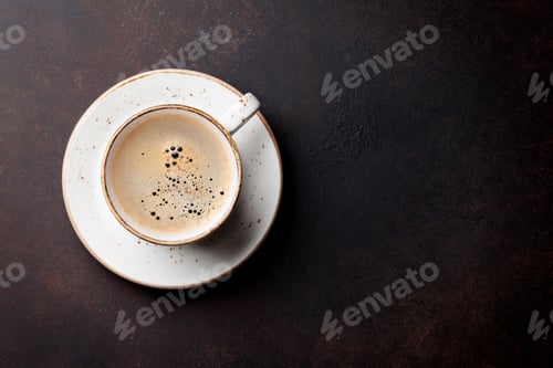 Preview: Coffee cup on old kitchen table