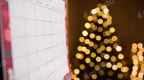 Preview: December calendar with blurred Christmas tree background