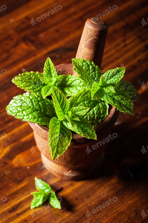 Preview: fresh mint Peppermint herb leaves in a mortar