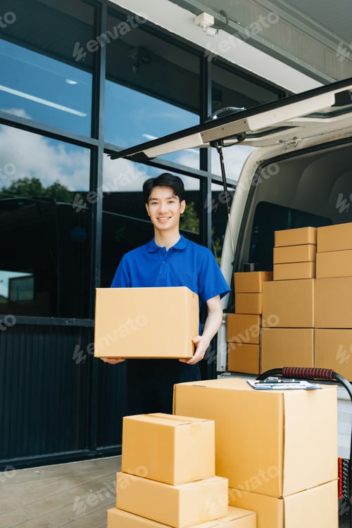 Preview: Asian courier delivery man searching the address on digital tablet. near van outside the warehouse.