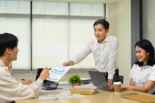 Preview: Business team brainstorming, collaborating on a new project in in modern corporate office.