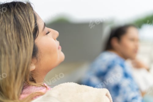 Preview: Exhausted overweight woman resting after running in a park