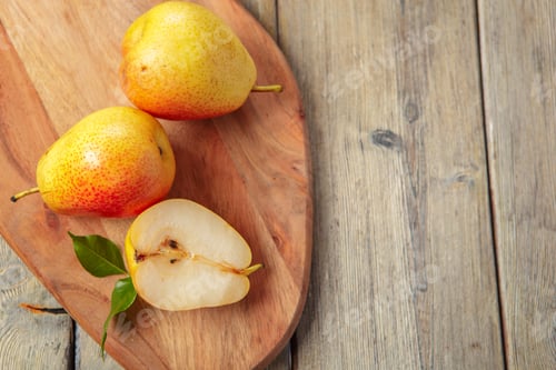 Preview: Ripe pears on rustic wooden table