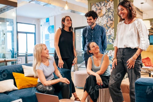 Preview: Group of young colleagues discussing startup project