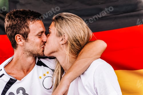 Preview: Supporters from Germany kissing at Stadium