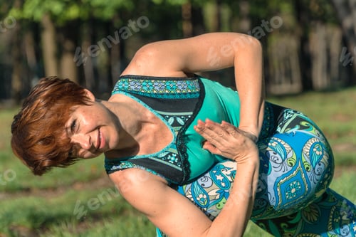 Preview: Yoga. The Girl In The Park Is Practicing Yoga