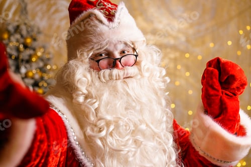 Preview: Profile photo of bearded santa claus using smartphone impressed christmas