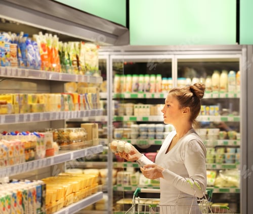 Preview: Woman Choosing A Dairy Products At Supermarket