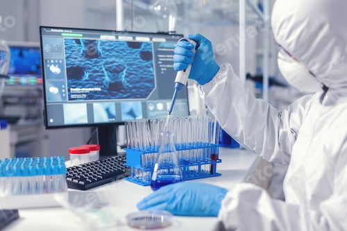 Preview: Micropipette used by medical researcher in laborator