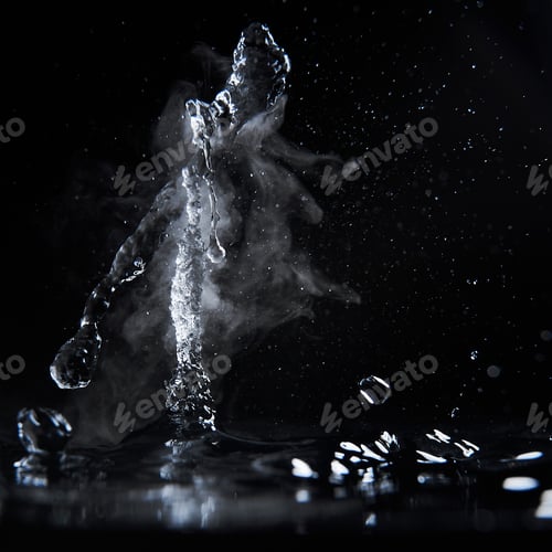 Preview: Boiling water splash with steam on black background closeup