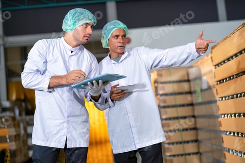 Preview: In warehouse quality control team checking drinking bottle stack on pallet before delivery