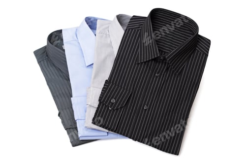 Preview: Elegant Dress Shirts Stacked on a White Surface