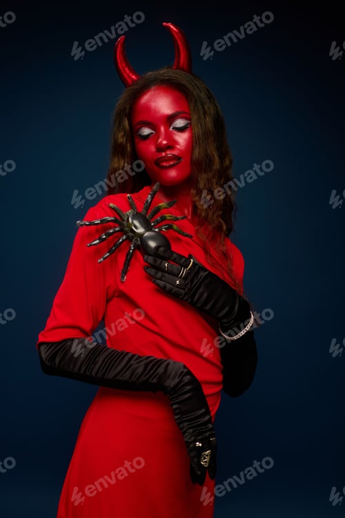 Preview: A striking red devil costume enhancing Halloween spirit with daring elegance and charm