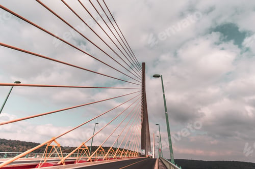 Preview: Contemporary bridge architecture under cloudy sky