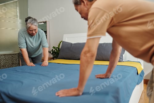 Preview: Senior Couple Changing Sheets