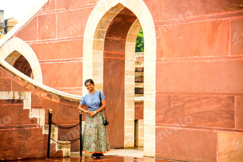 Preview: Woman tourist at the Jantar Mantar observatory, Jaipur, UNESCO World Heritage Site, India.